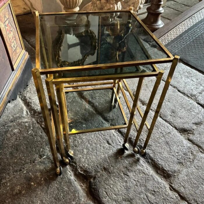 1960s mid century modern set of three brass and smoked glass nesting tables 0410