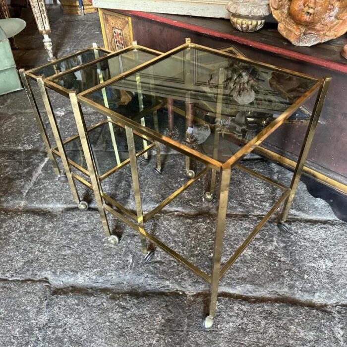 1960s mid century modern set of three brass and smoked glass nesting tables 2729