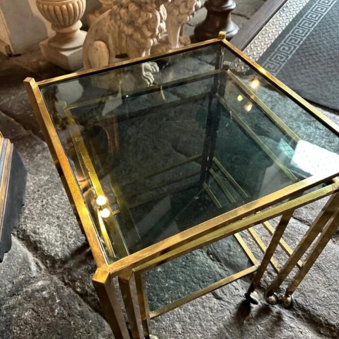 1960s mid century modern set of three brass and smoked glass nesting tables 8390