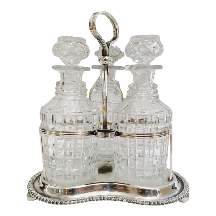 19th century cut glass triple spirit decanters in silver plated caddy 7419