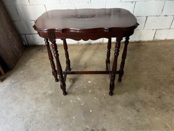 20th century victorian style flame mahogany six leg side table 4740