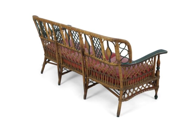 3 seat american art deco style wicker sofa with painted floral embellishments on the seat backs and 0307