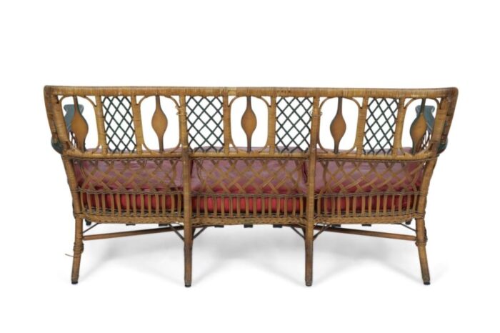 3 seat american art deco style wicker sofa with painted floral embellishments on the seat backs and 1809