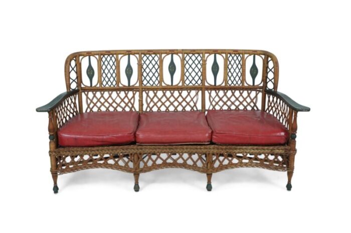 3 seat american art deco style wicker sofa with painted floral embellishments on the seat backs and 2727