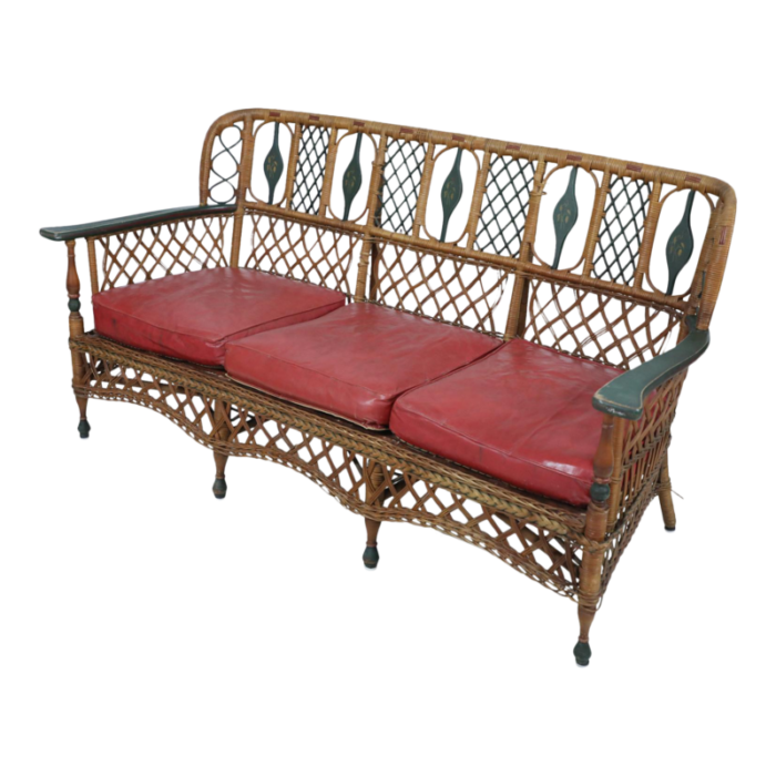 3 seat american art deco style wicker sofa with painted floral embellishments on the seat backs and 5631