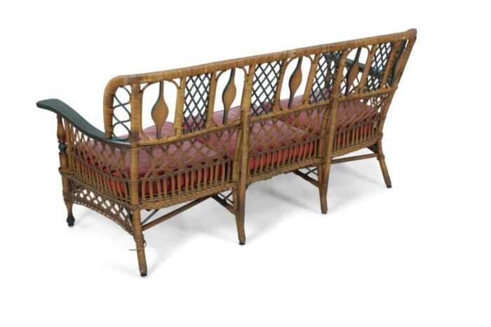 3 seat american art deco style wicker sofa with painted floral embellishments on the seat backs and 9874