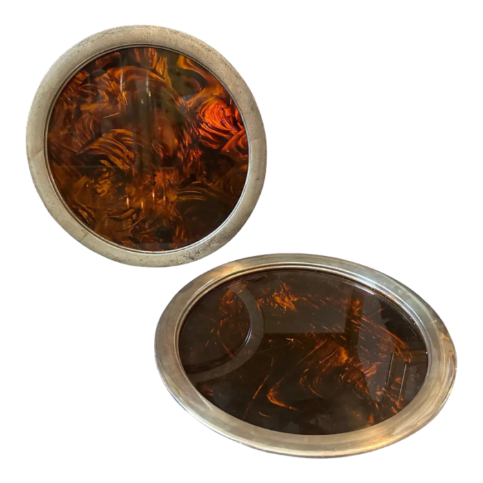 a pair of 1970s mid century modern fake tortoise lucite round trays by guzzini 1055