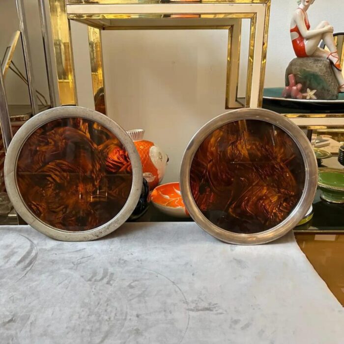 a pair of 1970s mid century modern fake tortoise lucite round trays by guzzini 1688