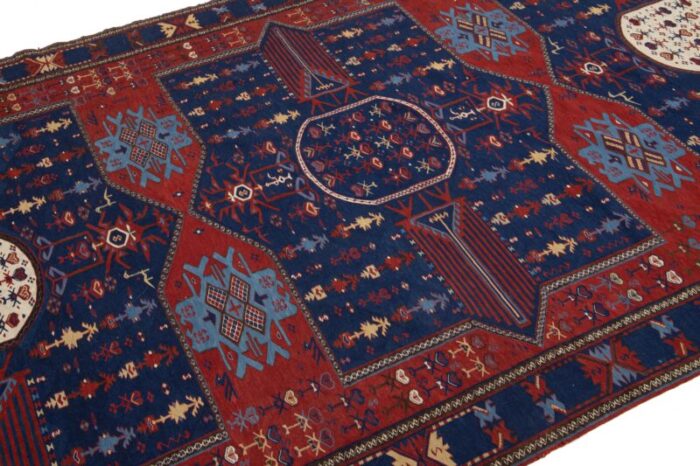 antique caucasian dagestan handmade wool runner in blue color with tribal motif 7764