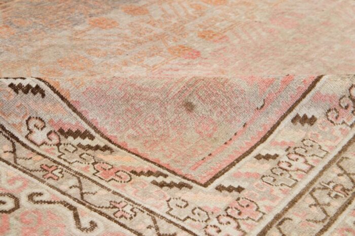 antique khotan wool rug handmade in peach color with geometric pattern 0643