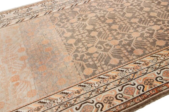 antique khotan wool rug handmade in peach color with geometric pattern 3538