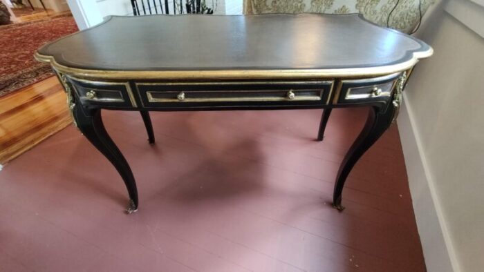 black and gold gilt writing desk with inlaid embossed leather topdesk drawersdesk edges louis xv influence 5138