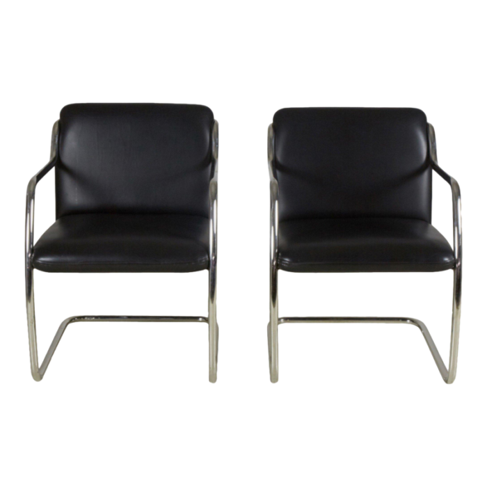 brueton contemporary black leather and steel tube frame armchairs a pair 5094