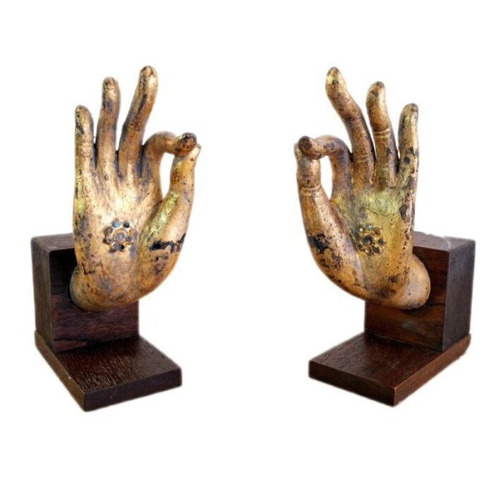 buddha hand fragments repurposed as bookends thailand mid 19th century set of 2 1