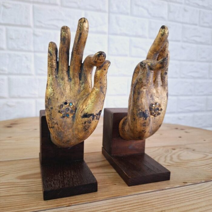 buddha hand fragments repurposed as bookends thailand mid 19th century set of 2 10