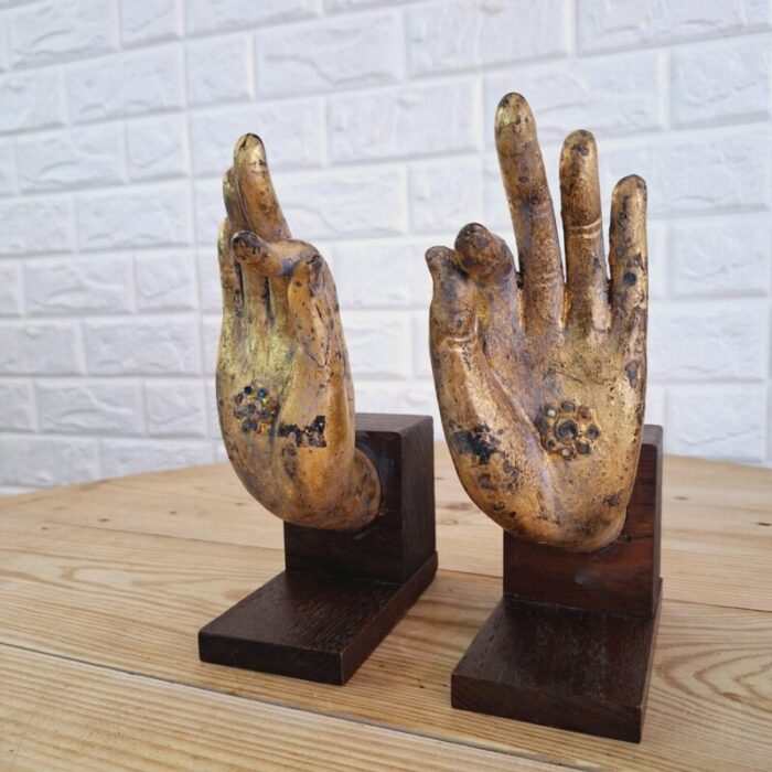 buddha hand fragments repurposed as bookends thailand mid 19th century set of 2 13