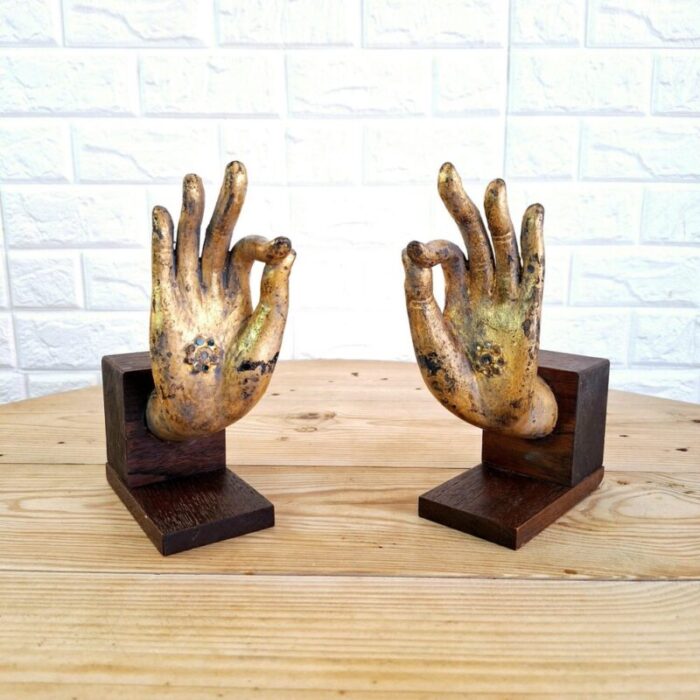 buddha hand fragments repurposed as bookends thailand mid 19th century set of 2 2