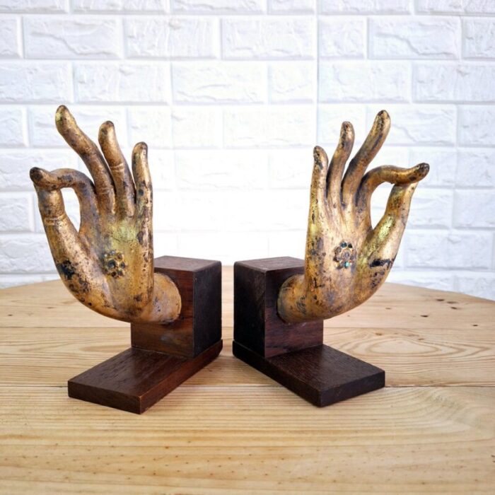 buddha hand fragments repurposed as bookends thailand mid 19th century set of 2 3