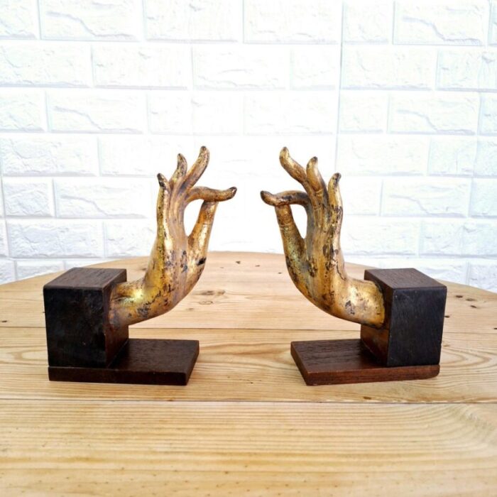 buddha hand fragments repurposed as bookends thailand mid 19th century set of 2 4