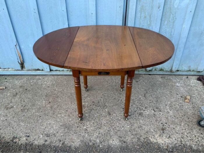 early 20th century antique federal style mahogany drop leaf side table on casters 5975