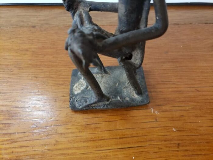 early 20th century ashanti cast bronze seated elder with baby gold weight from ghana 0014