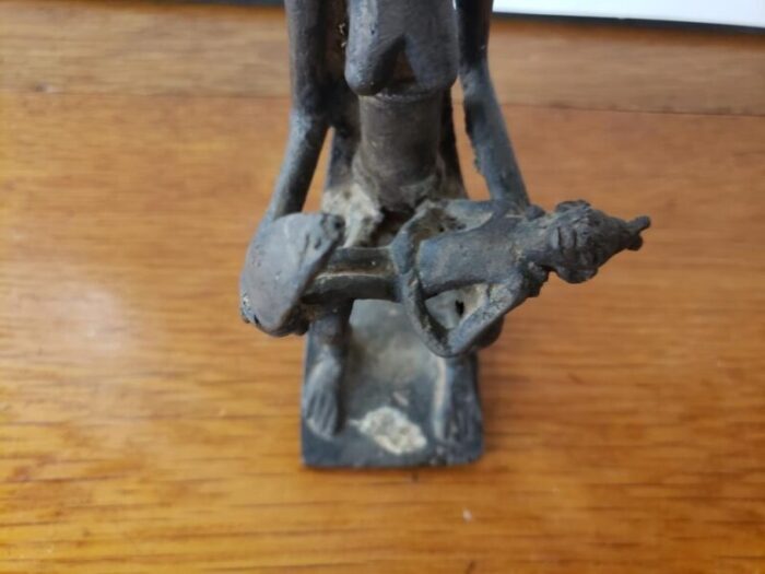 early 20th century ashanti cast bronze seated elder with baby gold weight from ghana 9928