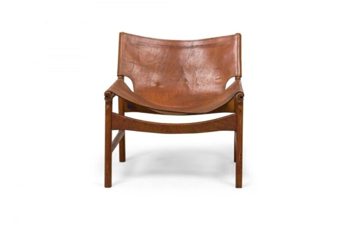 illum wikkels danish mid century caramel leather and oak sling design lounge chair 5132