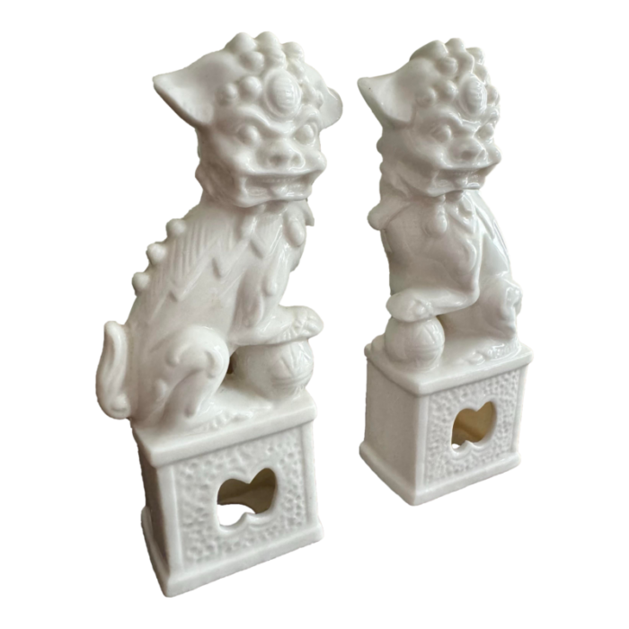 late 20th century white porcelain foo dogs a pair 8477