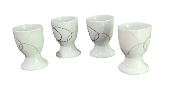 late 20th century white porcelain soft boiled egg cup holders set of 4 1069