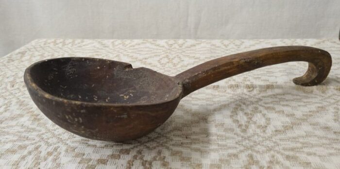 long antique wooden handled spoon 1