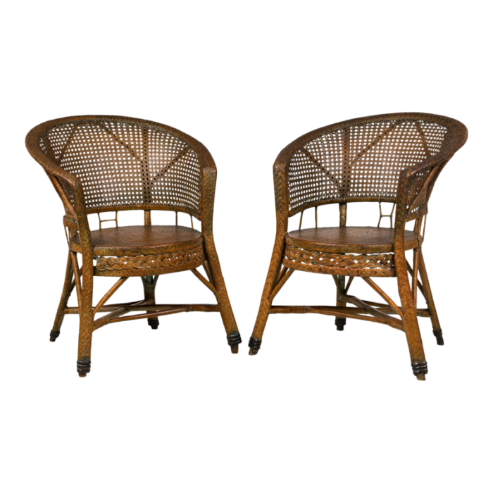 mid century american wicker and cane pull up armchairs a pair 2330