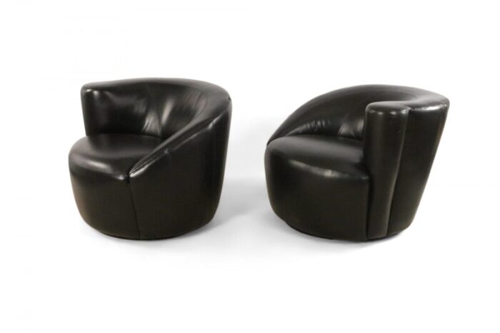 mid century black leather nautilus swivel armchairs a pair 3060