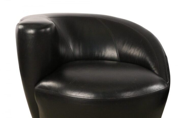 mid century black leather nautilus swivel armchairs a pair 8716