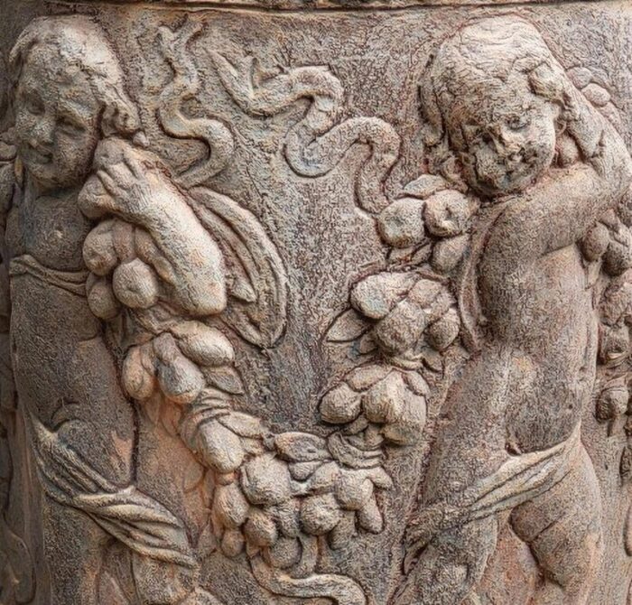 ornate cylinder with 20th century cachepot terracotta cherubs 3