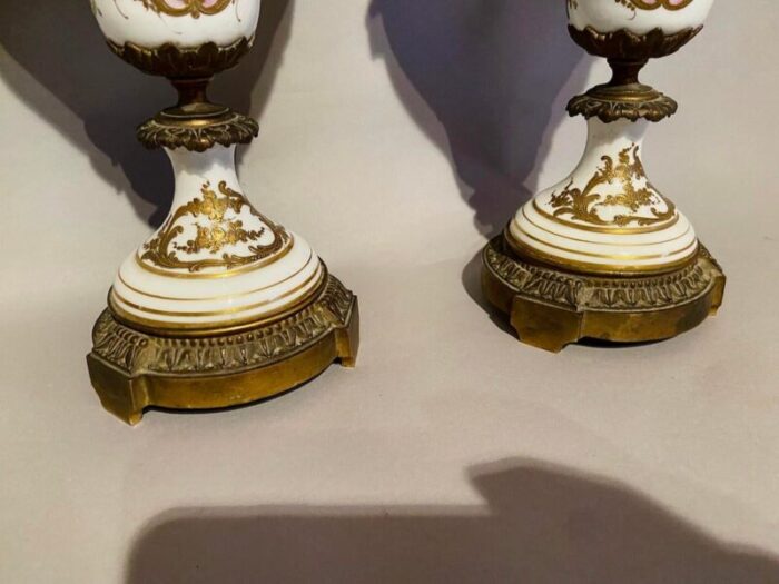 pair of 19th century french louis xvi sevres porcelain vases with bronze accents 4129