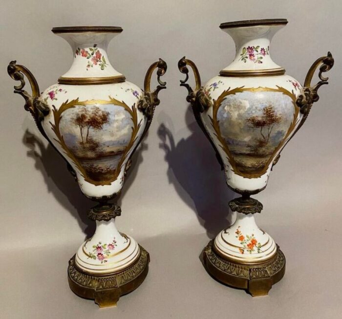 pair of 19th century french louis xvi sevres porcelain vases with bronze accents 7586