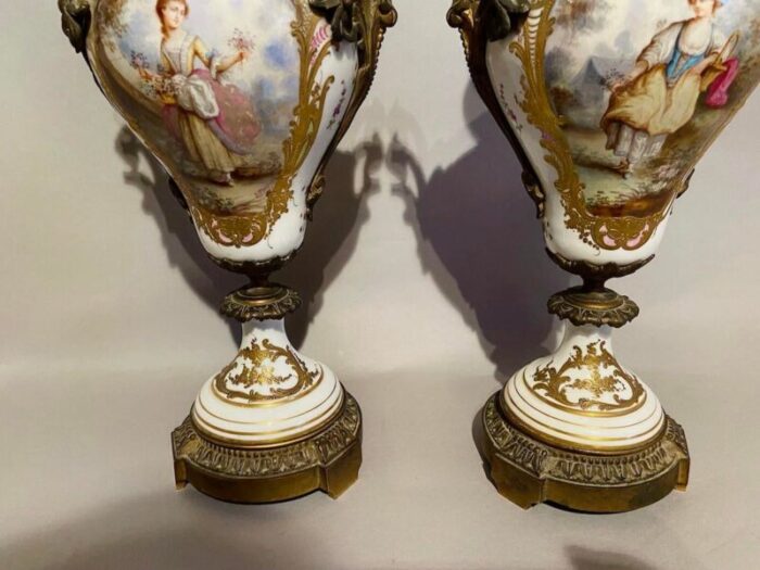 pair of 19th century french louis xvi sevres porcelain vases with bronze accents 8067