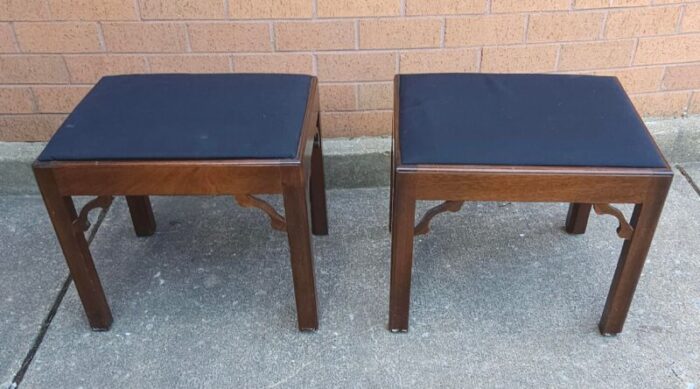 pair of chippendale style mahogany and upholstered foot stools 2224