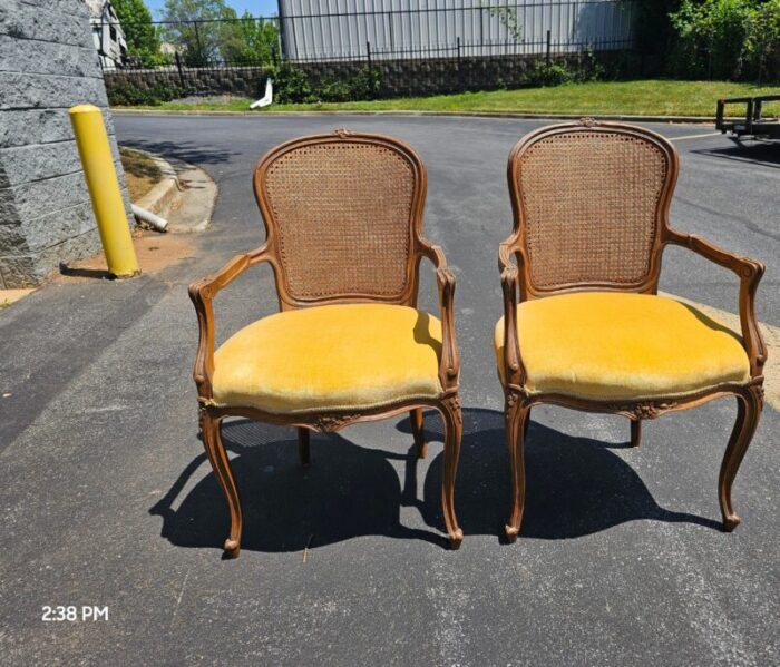 pair provincial style walnut cane back and velvet upholstered seat bergeres chairs 9950