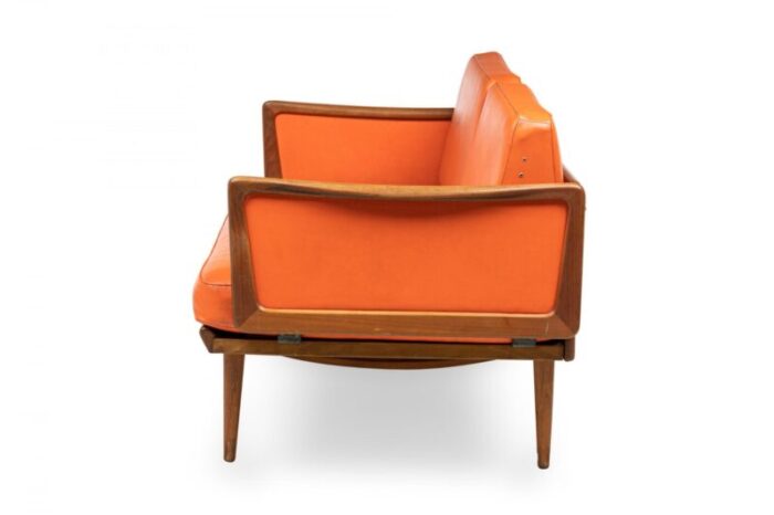 peter hvidt mid century danish expandable wood frame orange vinyl upholstered sleeper settee 4084