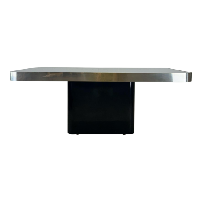 postmodern dining table with black glass top and brass accented border 5357