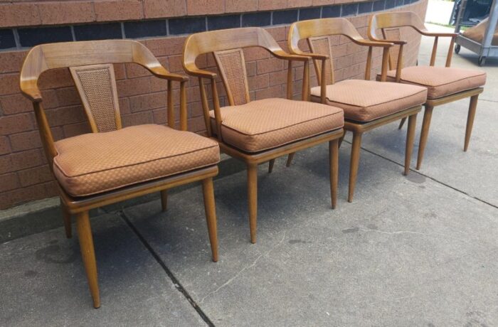 set of four lubberts and mulder for tomlinson walnut and cane bak armchair 9332