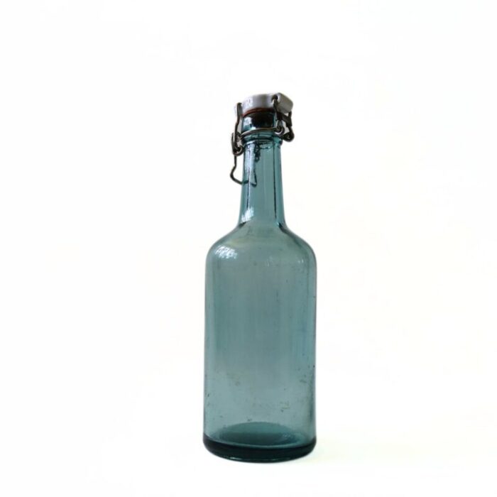 small green glass bottle with porcelain lid from arnaes sweden early 1900s 1