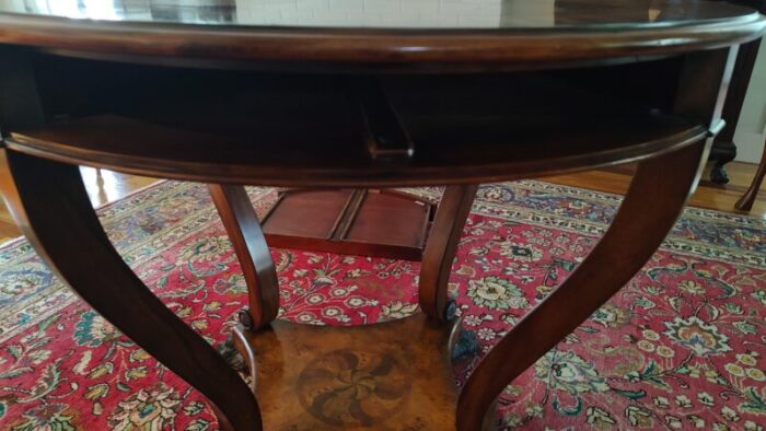 swirling teardrops centre circular table with two pull out drawers theodore alexander the original regency 0175