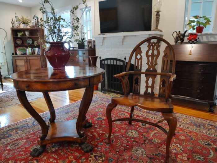 swirling teardrops centre circular table with two pull out drawers theodore alexander the original regency 3854