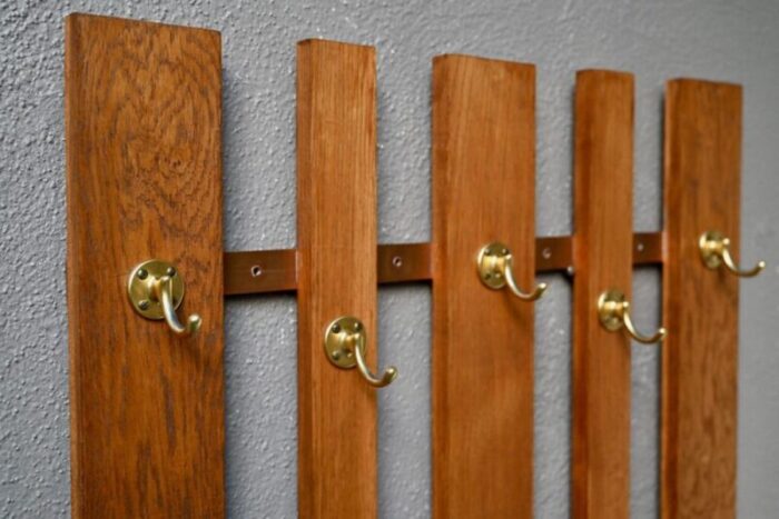 wall coat holder in oak and brass 1960s 2