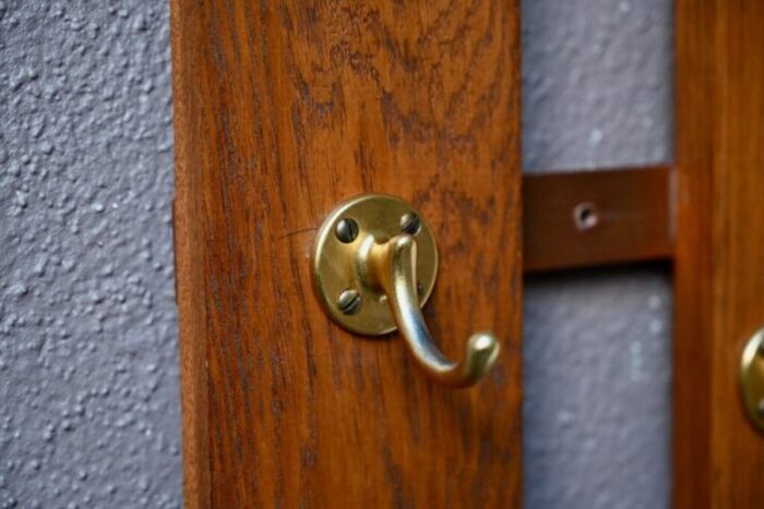 wall coat holder in oak and brass 1960s 4