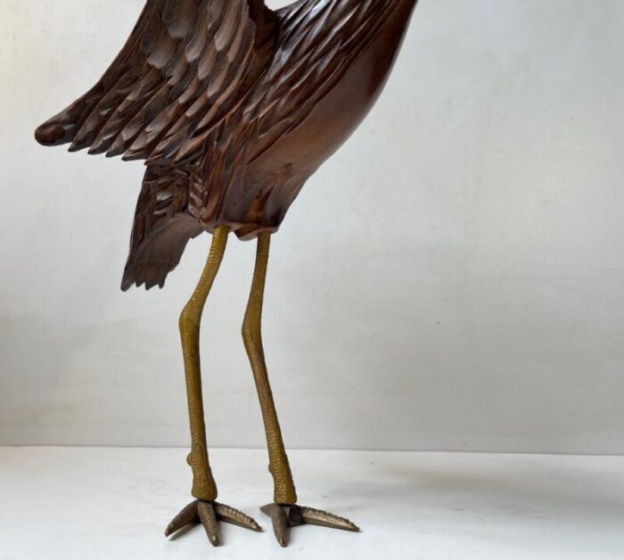 wooden crane bird with suspended skull 1940s 4