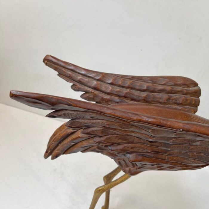 wooden crane bird with suspended skull 1940s 5