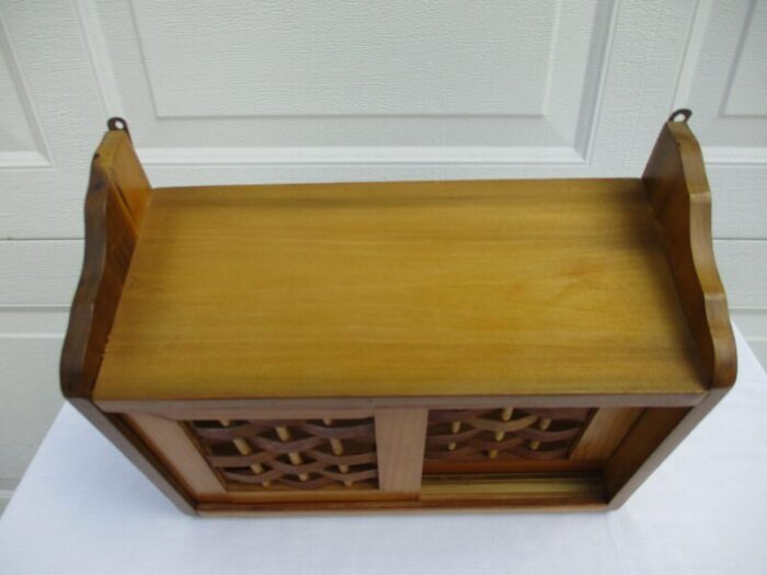 wooden wall cabinet with bark front doors 8420